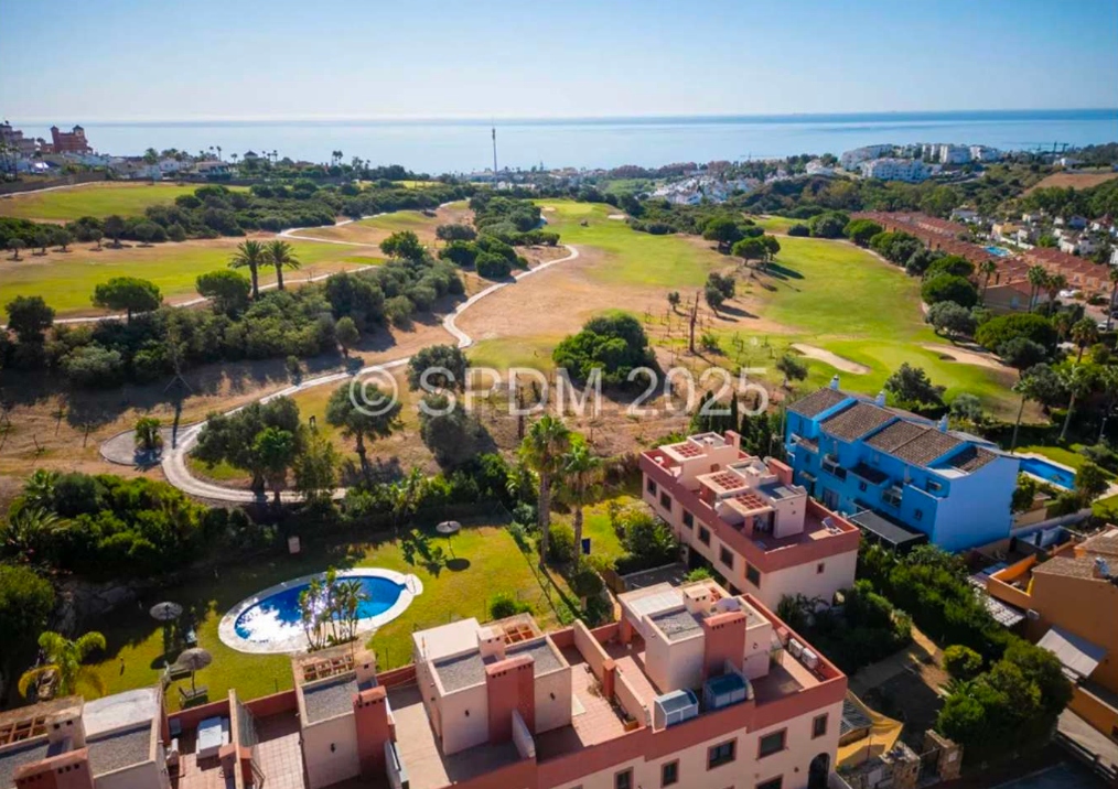 Villas del Golf Side 1